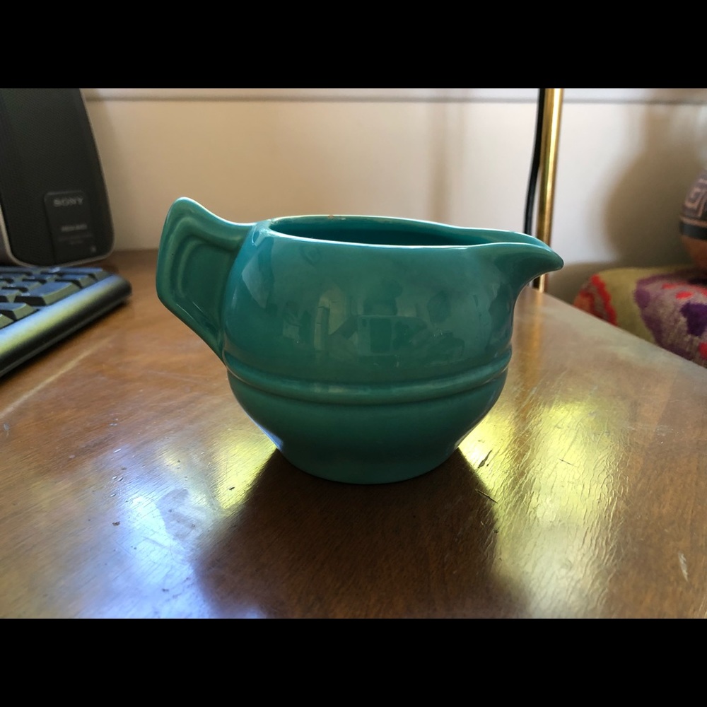 Vintage California pottery turquoise milk holder!